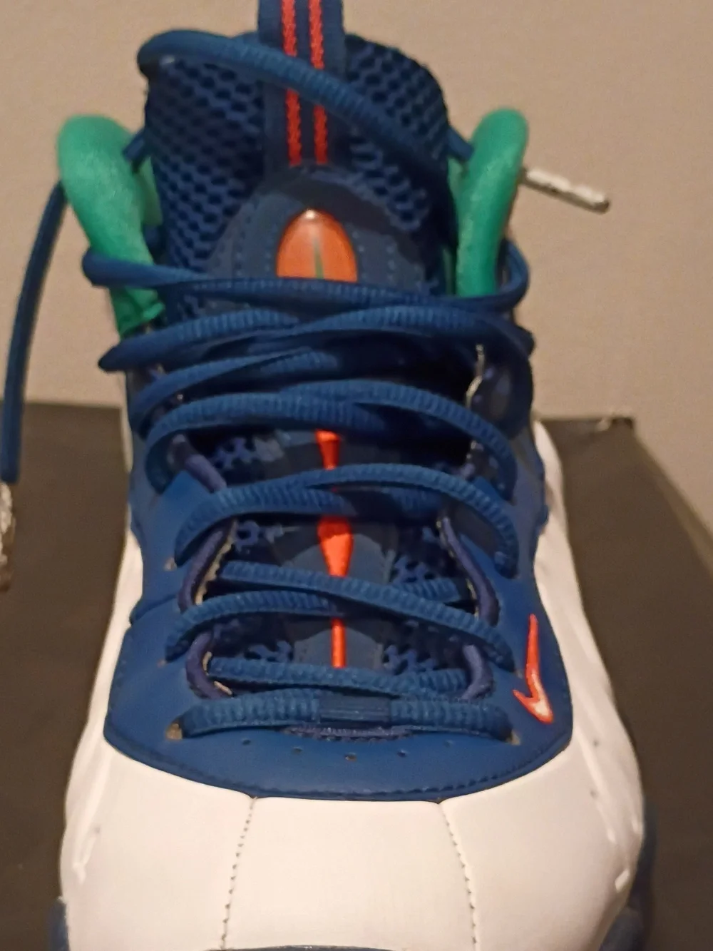 Nike Kids White and Blue Sneakers with Green and Orange Accents